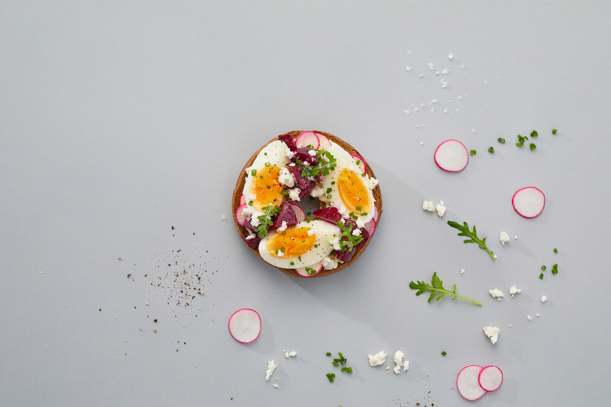 RYE BAGEL WITH CREAMY BEETROOT AND EGG SALAD
